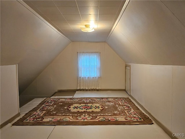 bonus room featuring vaulted ceiling