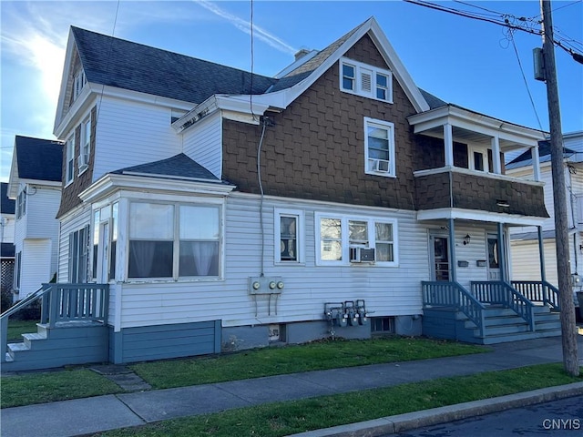 view of front of home with cooling unit