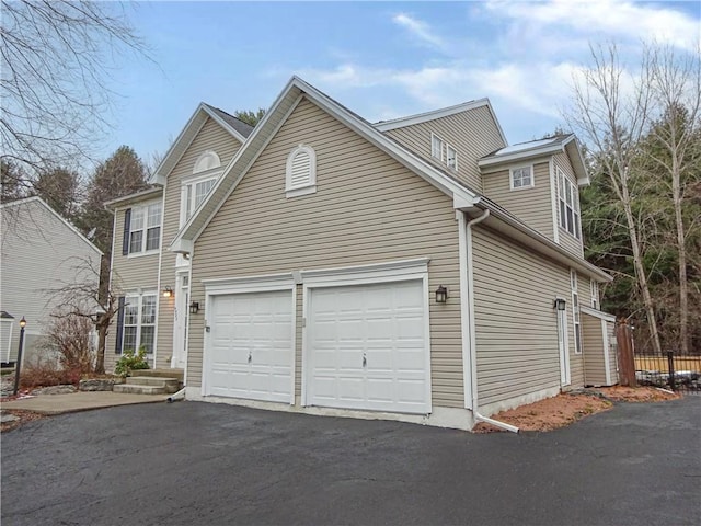 view of home's exterior with a garage