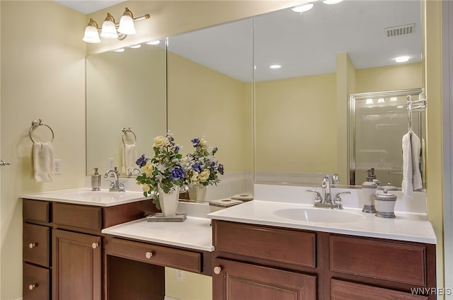 bathroom with vanity and walk in shower