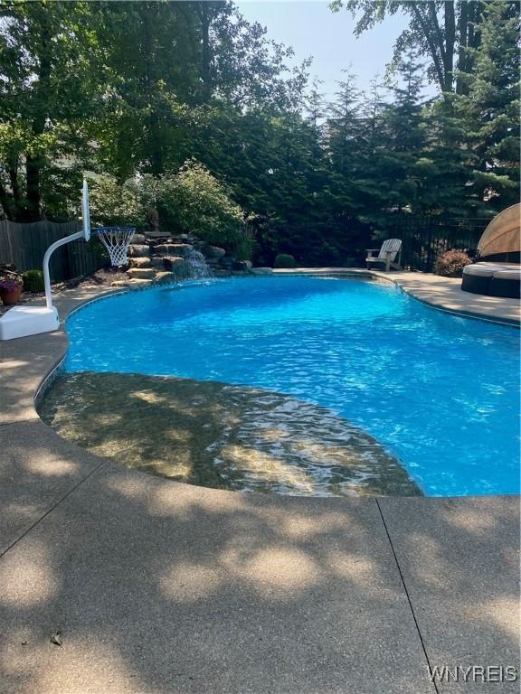 view of pool featuring a patio