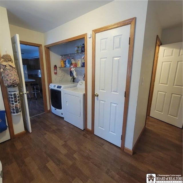 laundry room featuring dark hardwood / wood-style flooring and independent washer and dryer