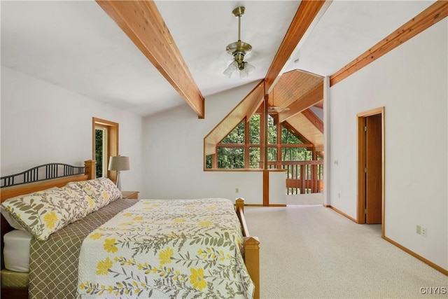 carpeted bedroom featuring vaulted ceiling with beams and ceiling fan