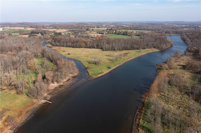 aerial view featuring a rural view and a water view