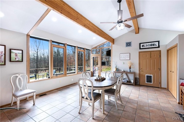 tiled dining area featuring lofted ceiling with beams and ceiling fan