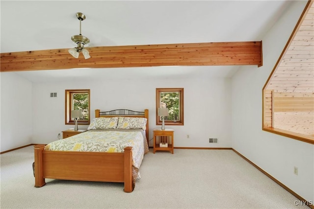 bedroom with light carpet, multiple windows, and ceiling fan