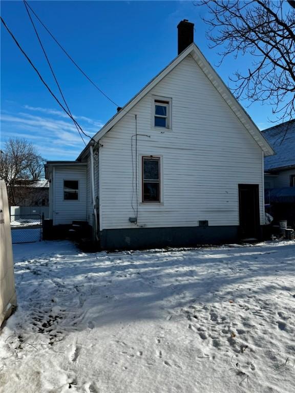 view of snow covered house