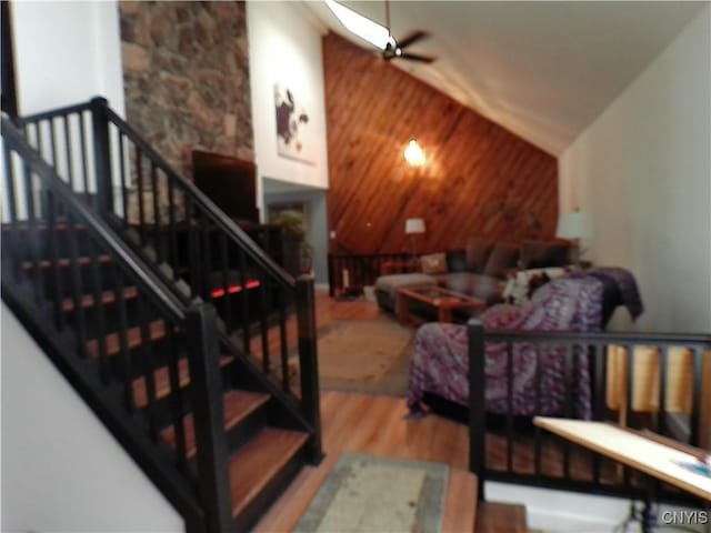 living room with ceiling fan, wooden ceiling, lofted ceiling, and hardwood / wood-style flooring