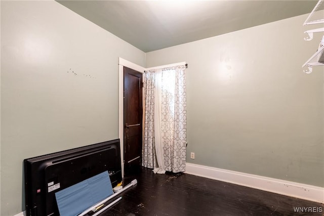 interior space with dark hardwood / wood-style floors