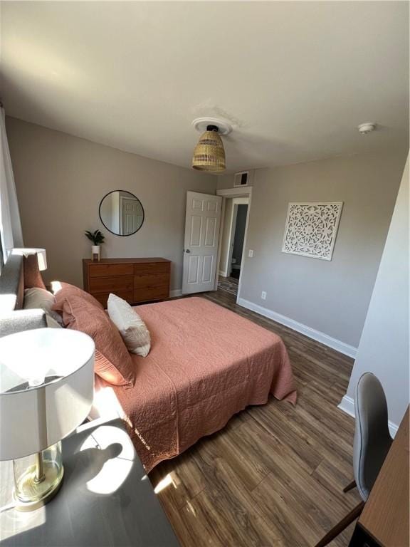 bedroom featuring dark hardwood / wood-style floors