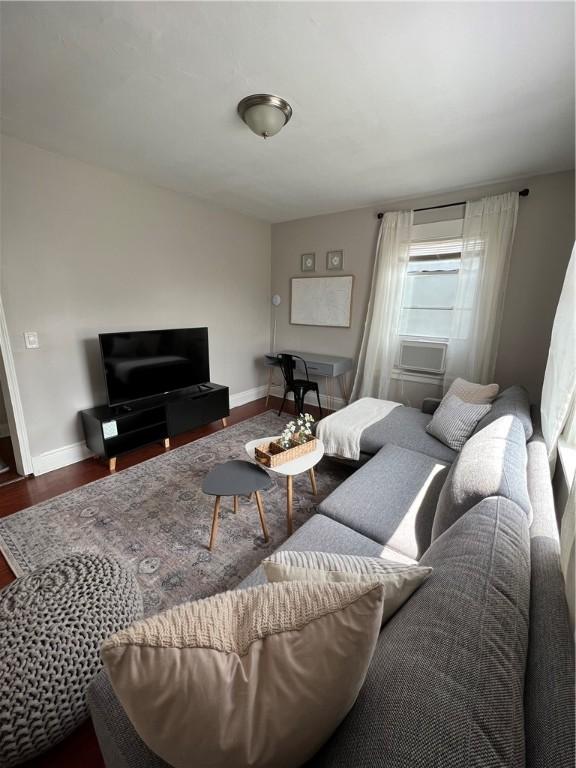 living room featuring dark hardwood / wood-style floors