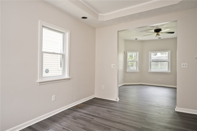 empty room with ceiling fan and dark wood-type flooring