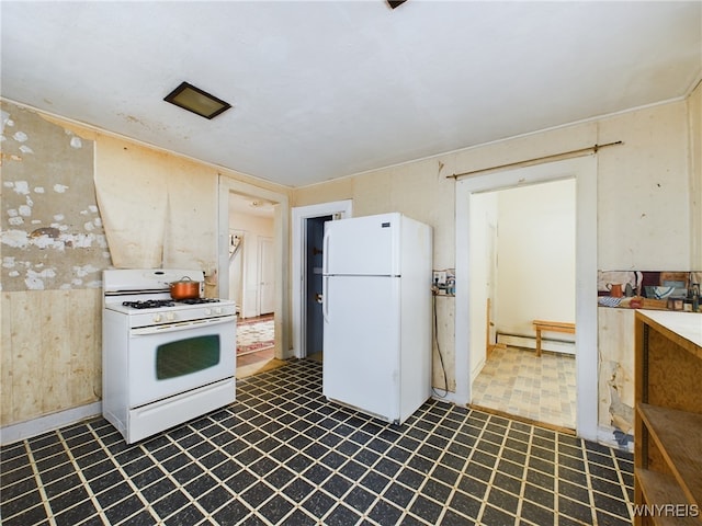 kitchen featuring baseboard heating and white appliances