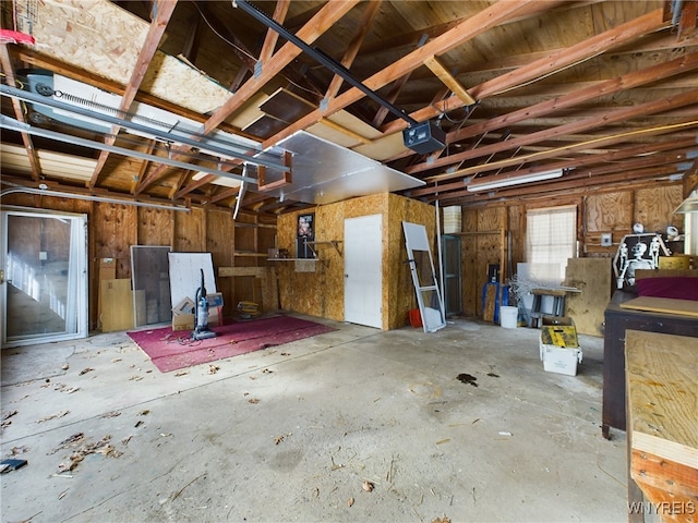 garage featuring a garage door opener