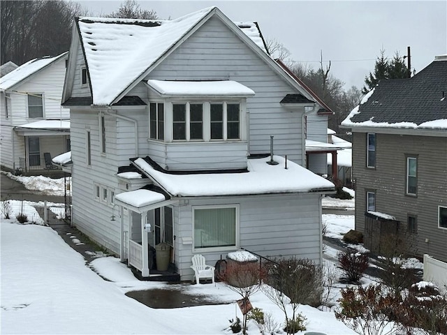 view of snow covered property