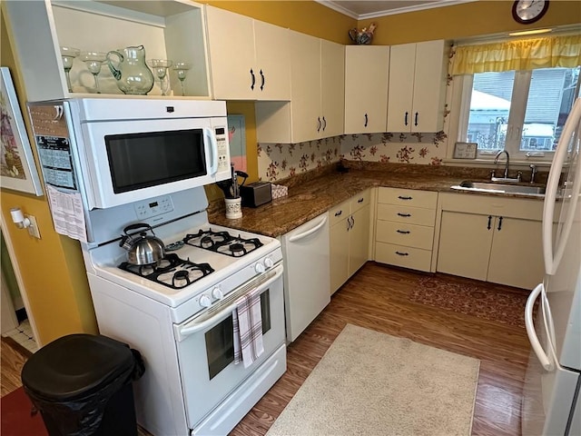 kitchen featuring ornamental molding, white appliances, sink, dark hardwood / wood-style floors, and white cabinetry