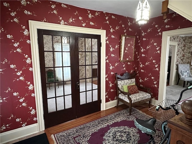 doorway to outside with french doors, hardwood / wood-style floors, and plenty of natural light