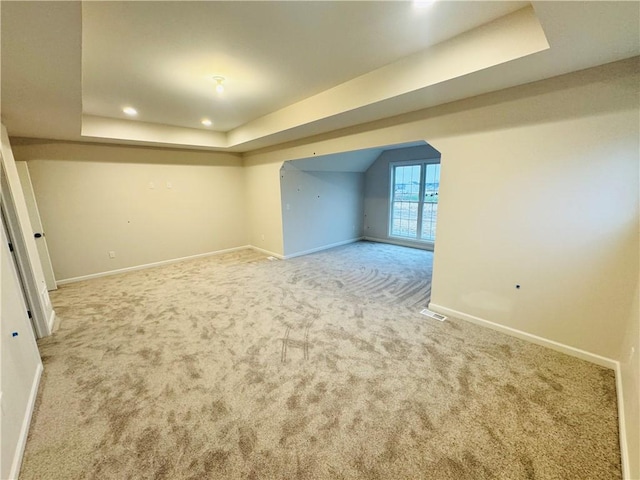 basement with carpet flooring