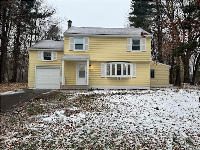 view of front property with a garage