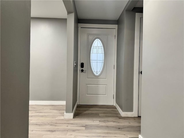 foyer with light hardwood / wood-style floors