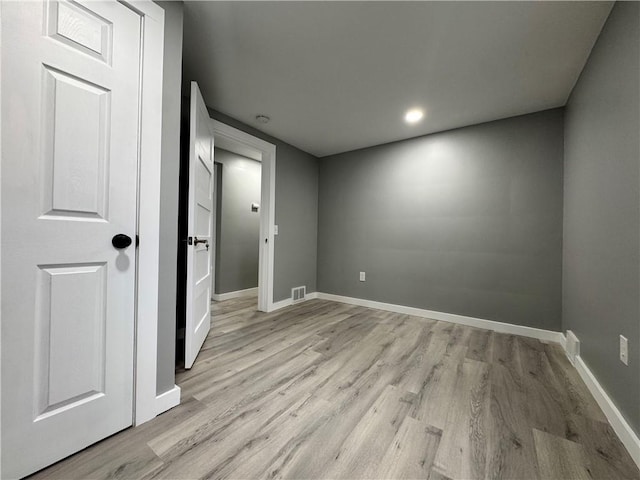 empty room with light wood-type flooring