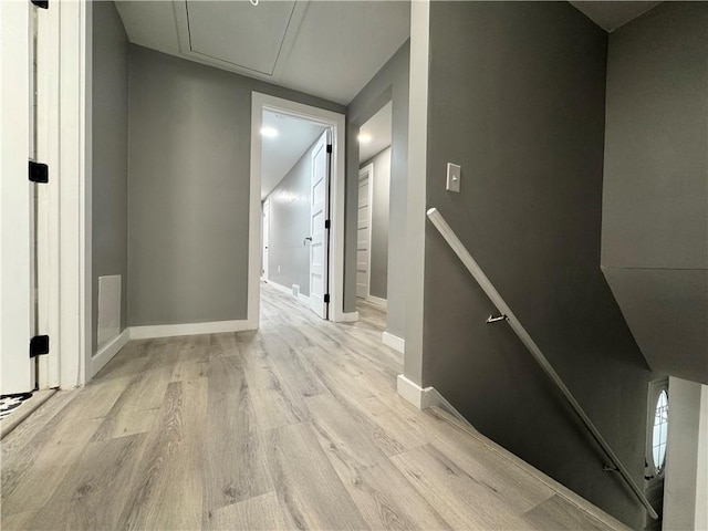 corridor featuring light hardwood / wood-style flooring