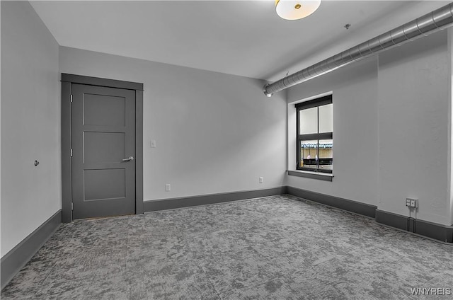 view of carpeted spare room