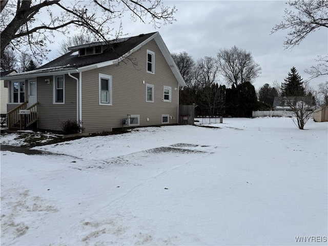 view of snow covered property