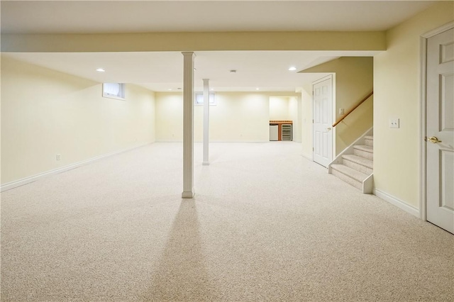 basement with light carpet