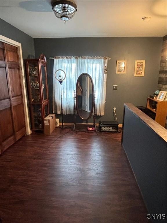 foyer entrance featuring dark hardwood / wood-style floors