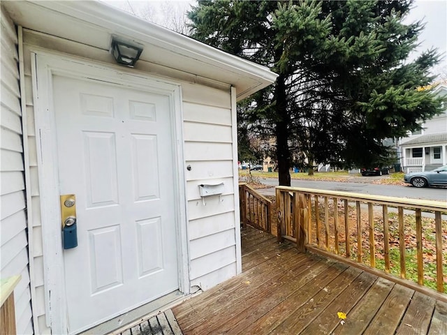 doorway to property featuring a deck