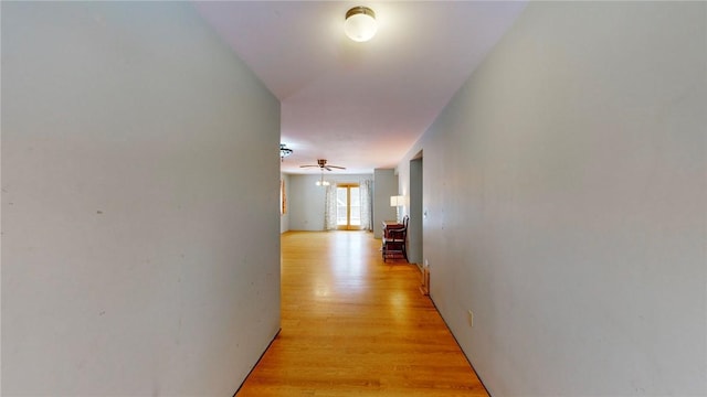 hallway featuring light hardwood / wood-style flooring