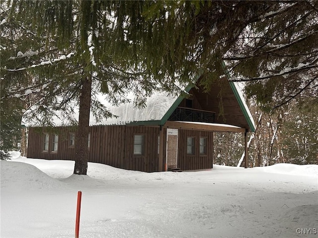 view of snow covered property