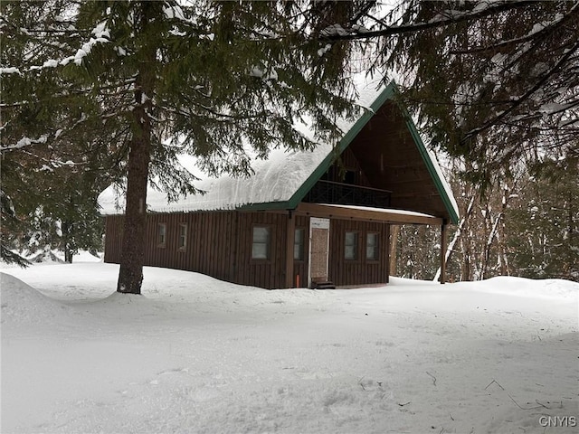 view of snow covered property