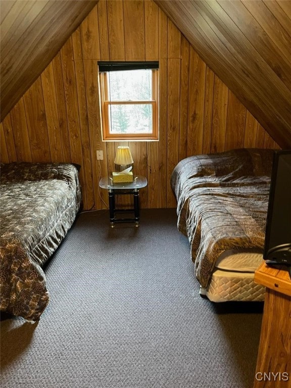 bedroom featuring wood ceiling, carpet flooring, lofted ceiling, and wooden walls