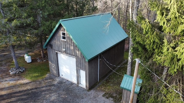 view of outbuilding featuring a garage