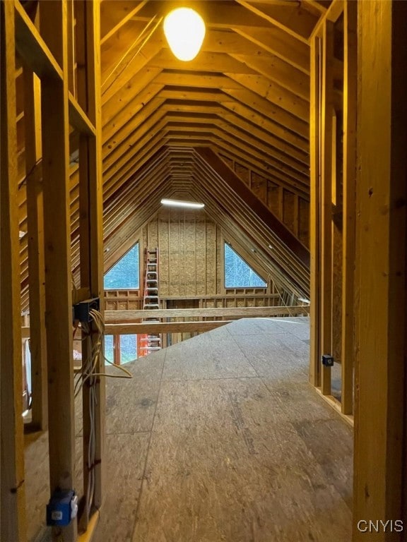 attic featuring plenty of natural light