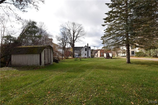 view of yard with a storage shed