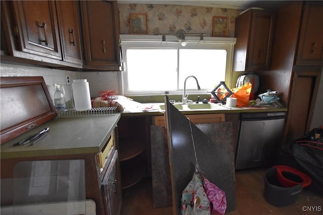228 Main St, Theresa, NY 13691 - kitchen featuring stainless steel dishwasher and backsplash