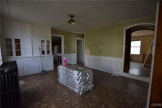 kitchen featuring white cabinets