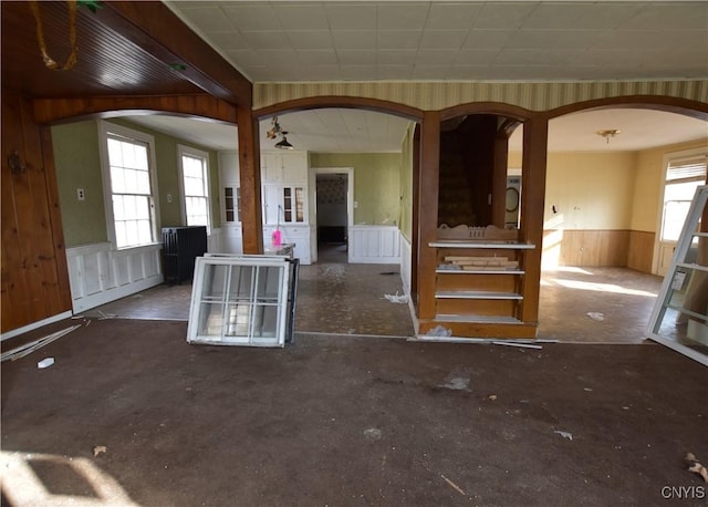 interior space with wooden walls and washer / dryer