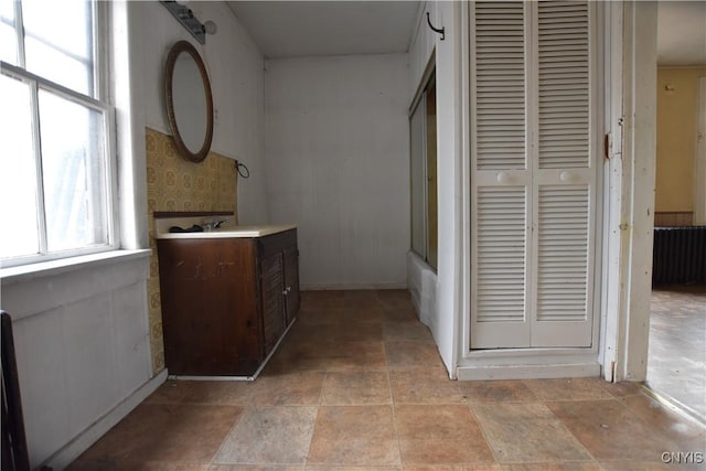 bathroom featuring vanity and bathing tub / shower combination