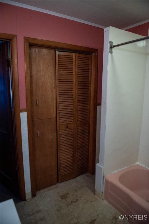 bathroom with ornamental molding