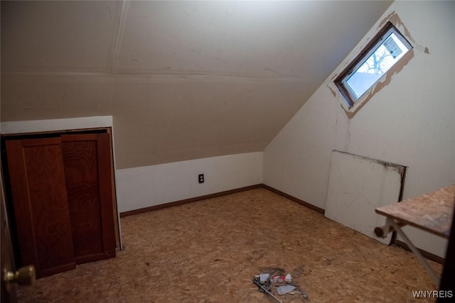 bonus room with vaulted ceiling