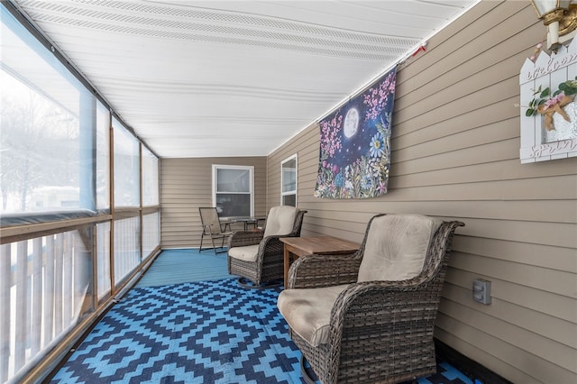 sunroom / solarium with lofted ceiling