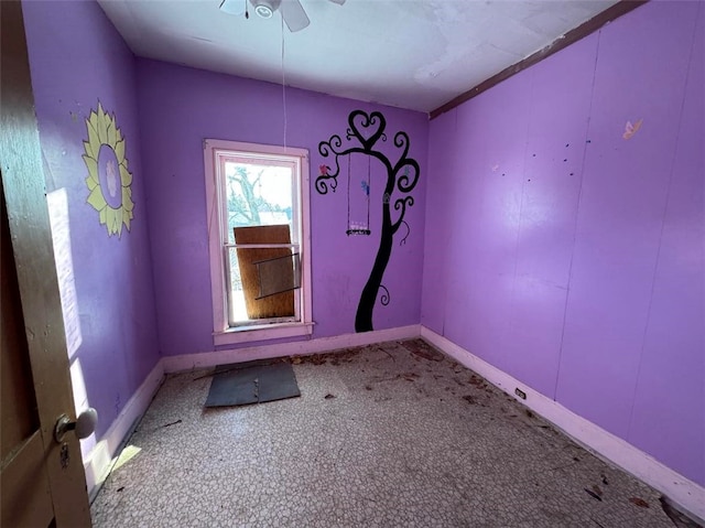 spare room featuring ceiling fan