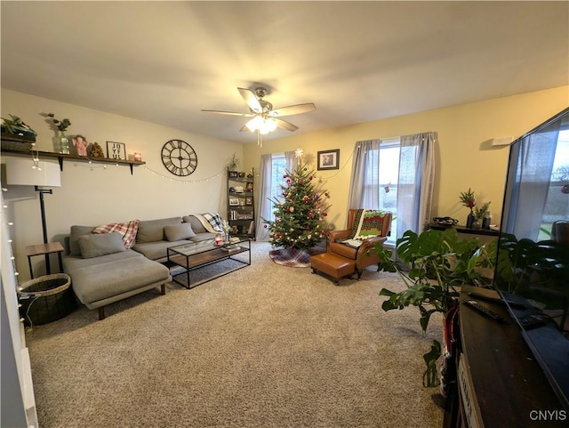 living room with carpet and ceiling fan