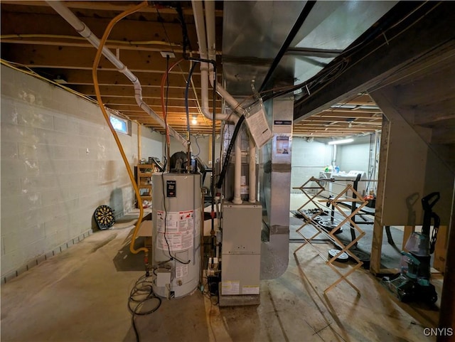 basement with gas water heater and heating unit