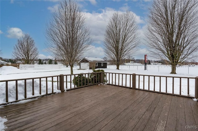 view of snow covered deck