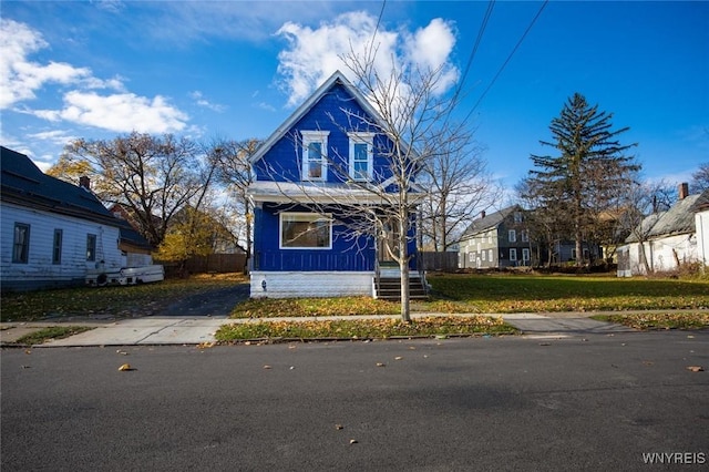 view of front of home with a front yard